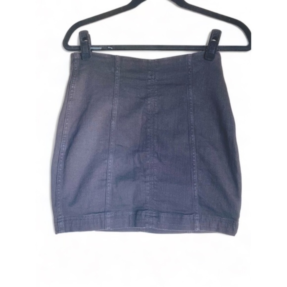 FREE PEOPLE Black stretchy mini skirt with back zip.